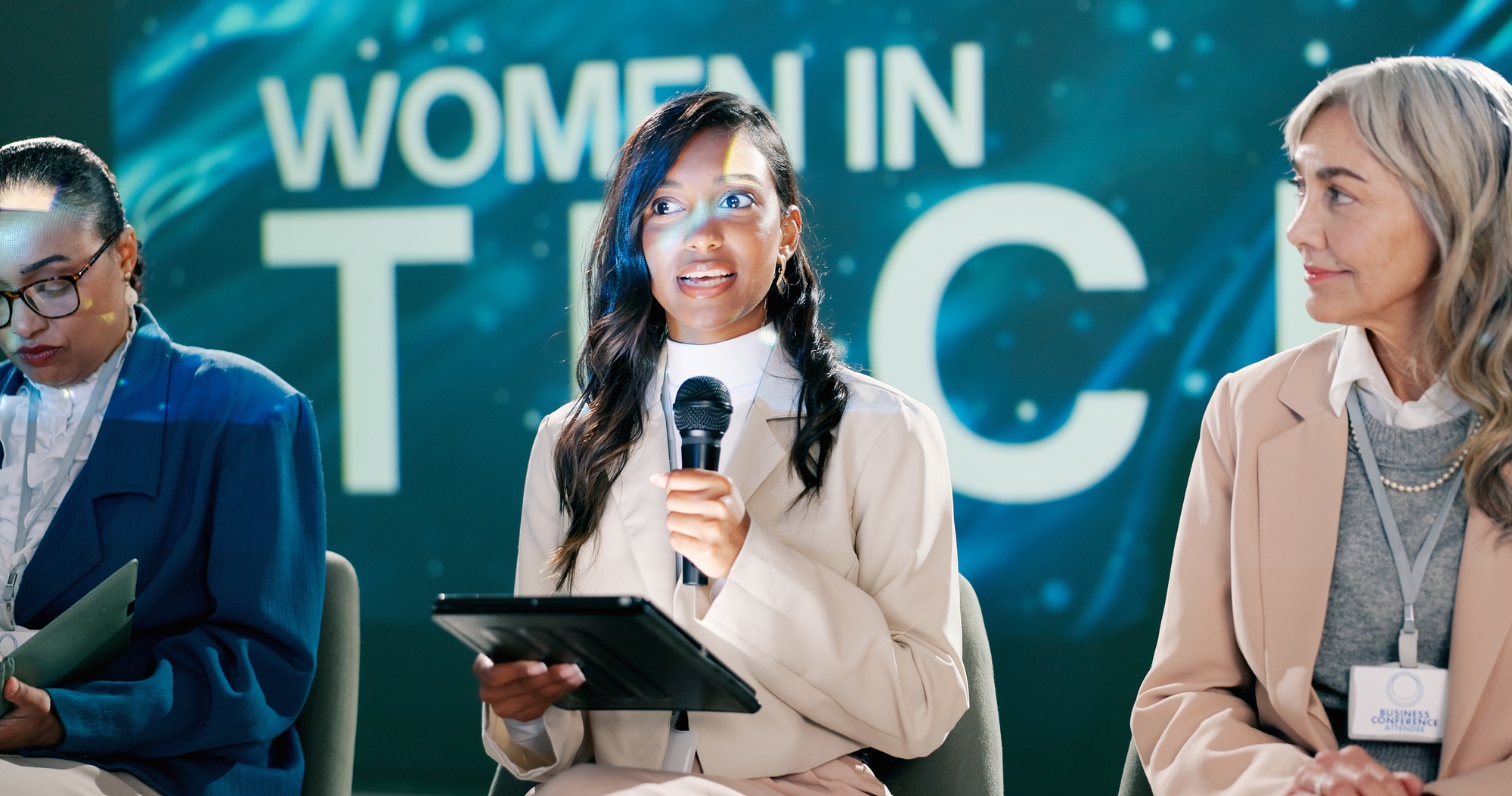 Mic, seminar and woman on stage, speaker and motivation for gender equality, leadership and speech.
